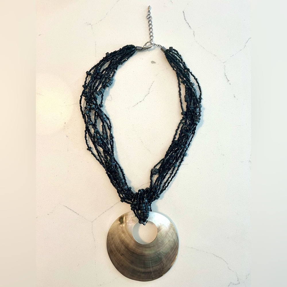 Binjara Traders purchase (St.Armand ,Sarasota) Abalone and Black Bead Necklace.
